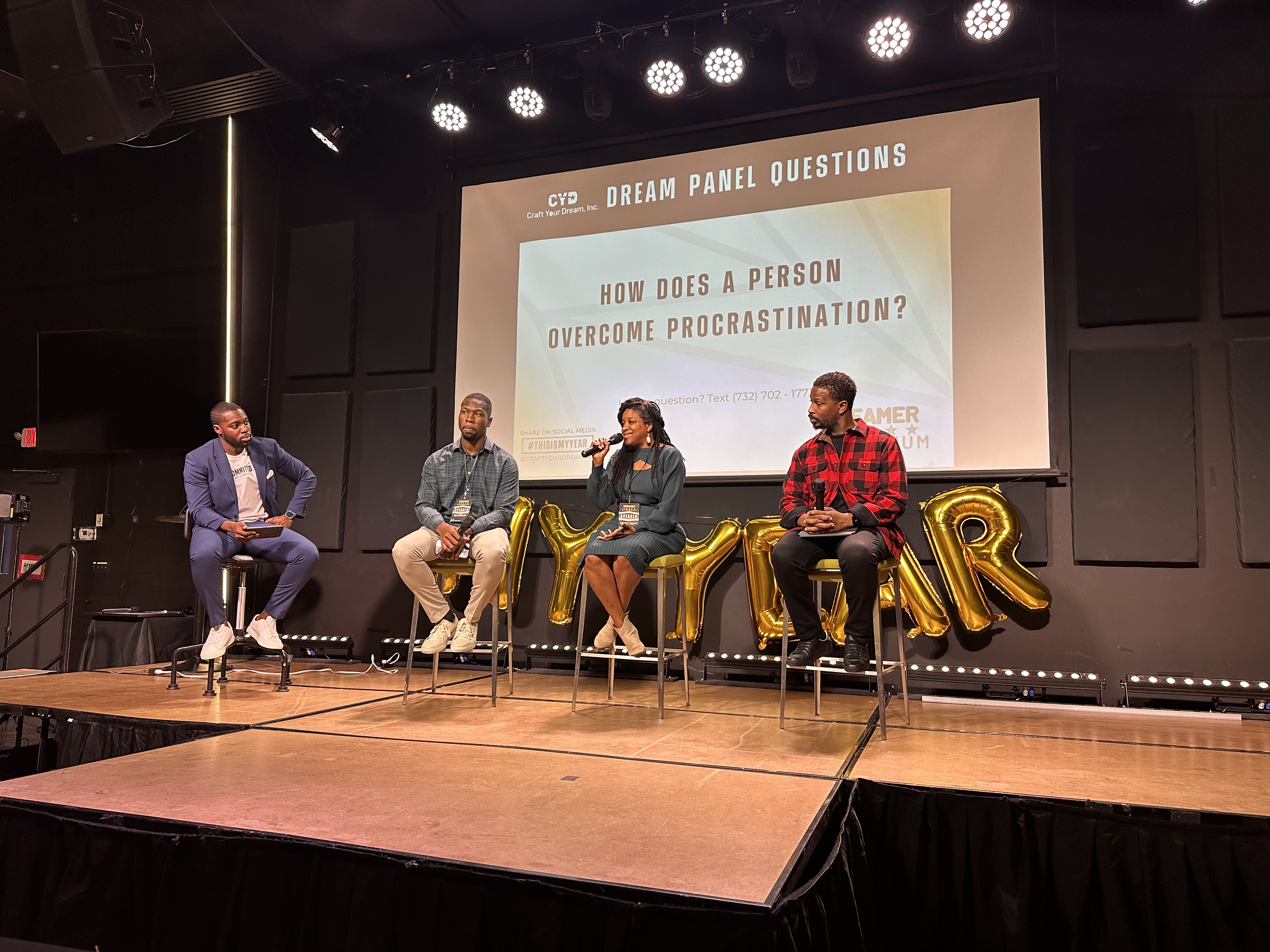 This is a photo of our Dream panel from our main growth conference, the Dreamer Symposium!
